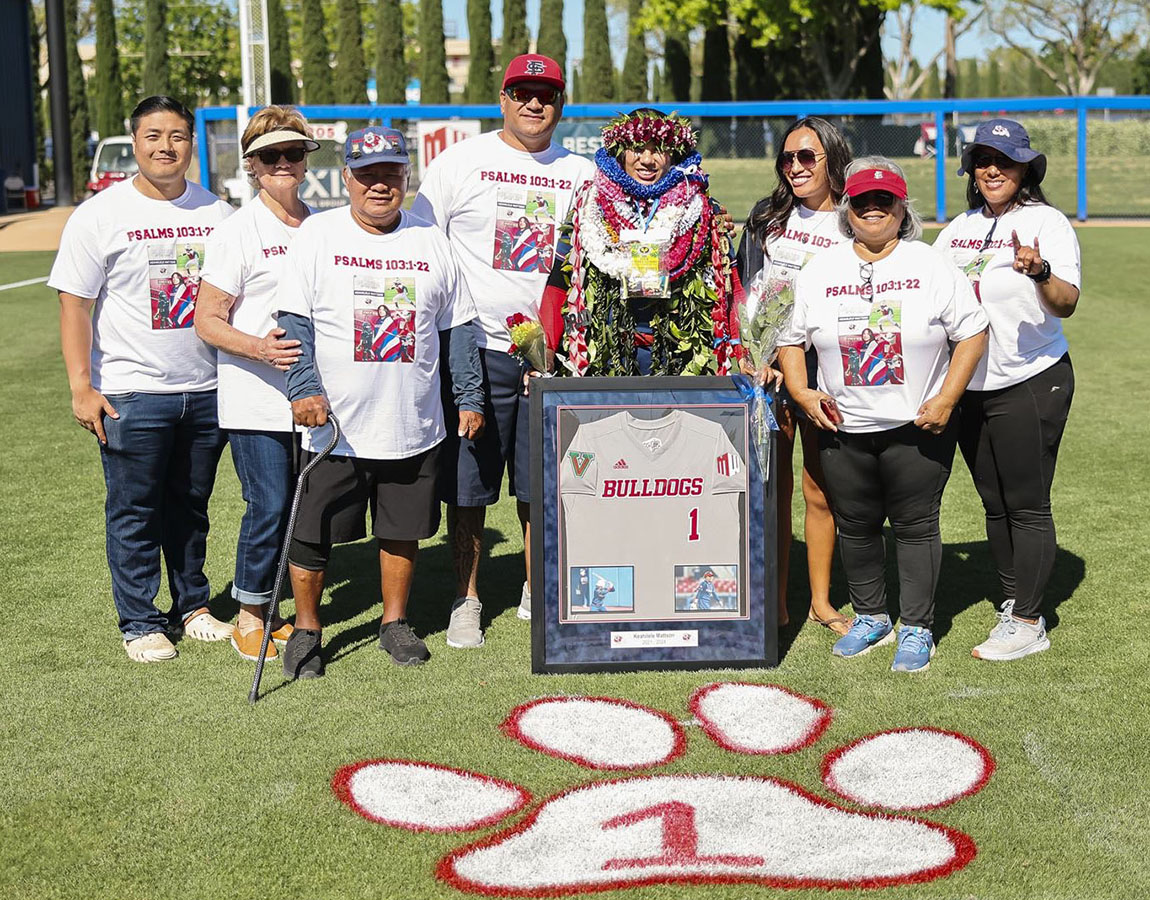 Keahilele Mattson with family at softball team's senior day