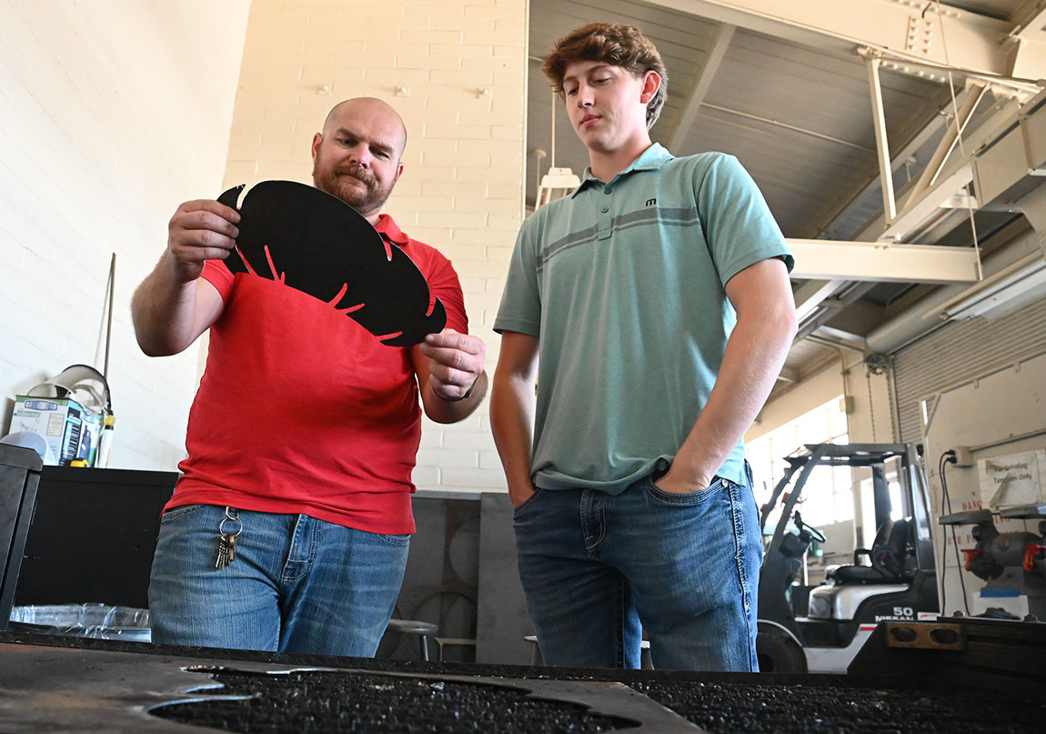 Lee Azevedo and faculty Chris McKenna