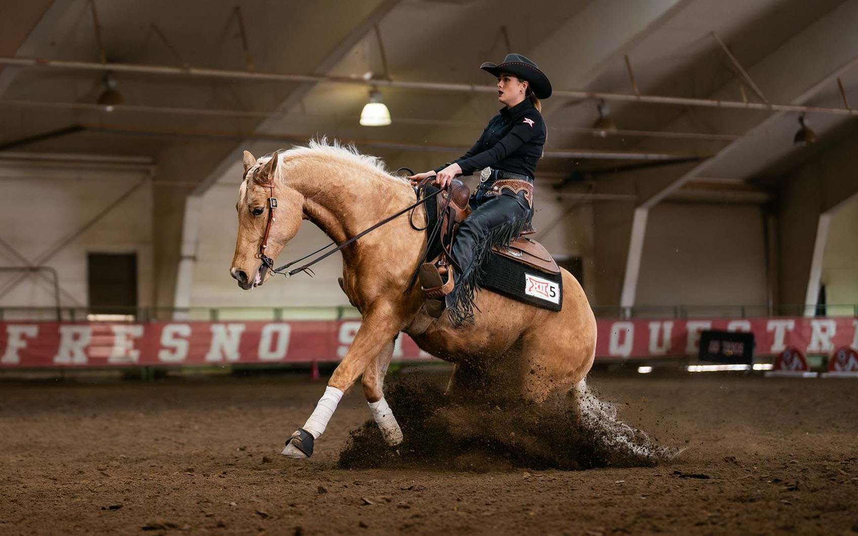 Shelby Robinette competing in equestrian