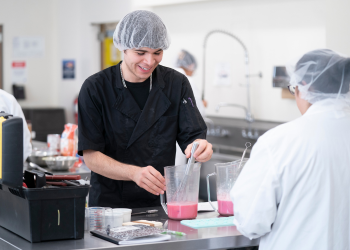Student working in food processing lab 