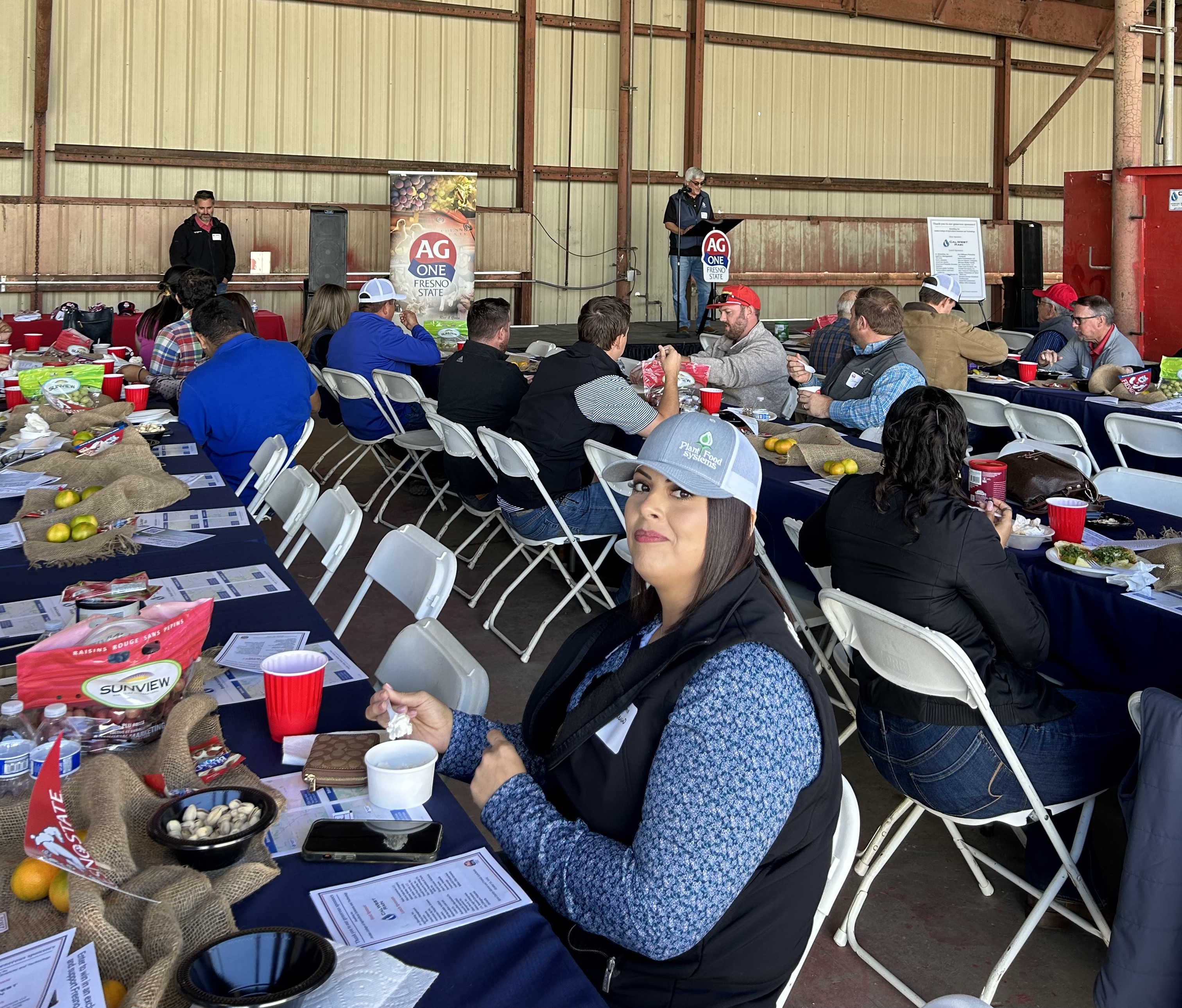 Audience enjoying speech from Cal West Rain CEO Rick Skaff 