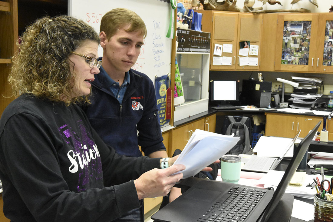 Cameron Standridge with a teacher during his student teaching at Madera South High School