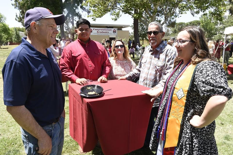 Farm Manager and Pia Martinez and family at graduation reception