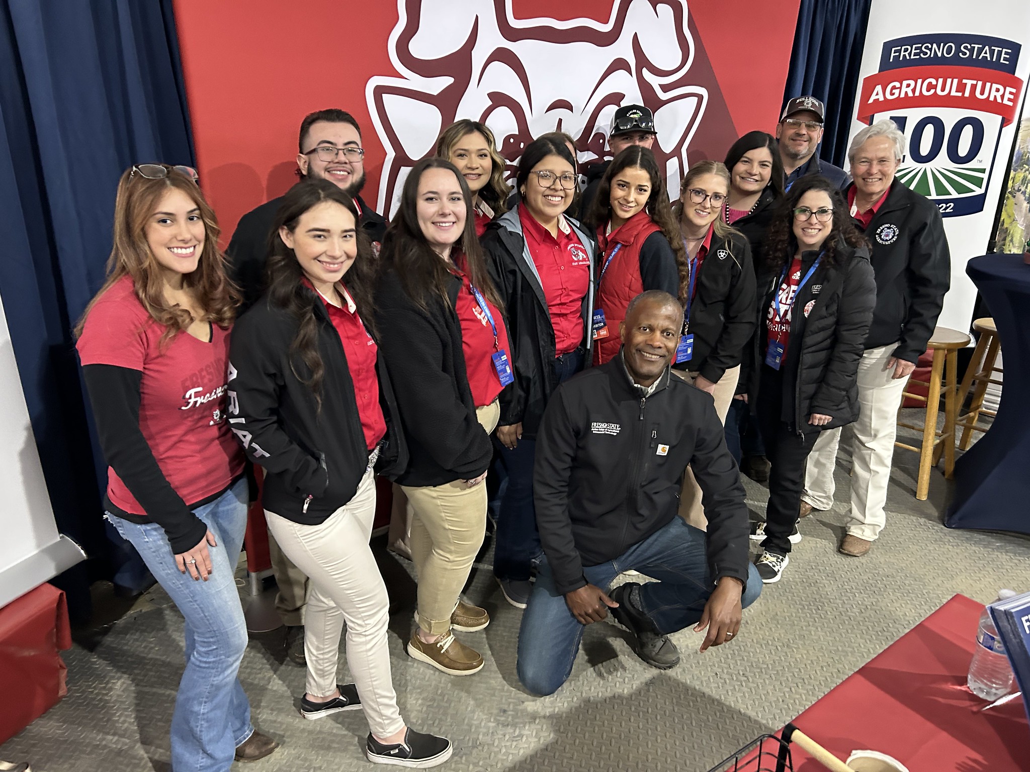 Fresno State Jordan College Dean and the Ag Ambassador students share insights into innovation at the annual World Ag Expo information booth.