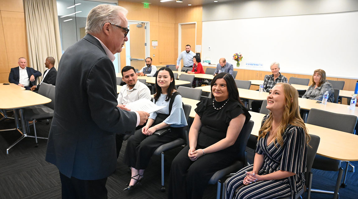 /images/2023-24/ag-scholar-awards-2024b.jpg Jim Patterson and students at Ag Scholar Awards