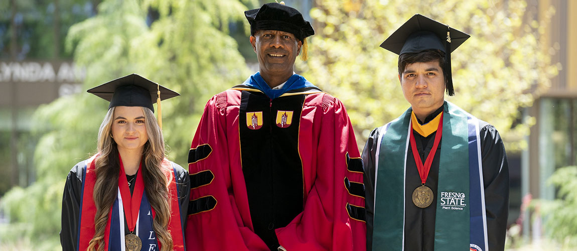 Jordan College Dean Rolston St. Hilaire and Dean's Medalists Reyna Mero and M. Orlando Tapia