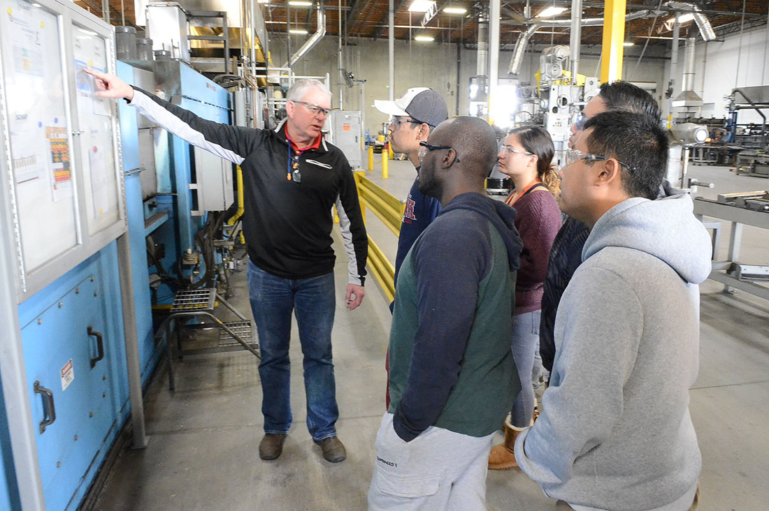 John Marr leading a student tour of the Industrial Technology department facilities.