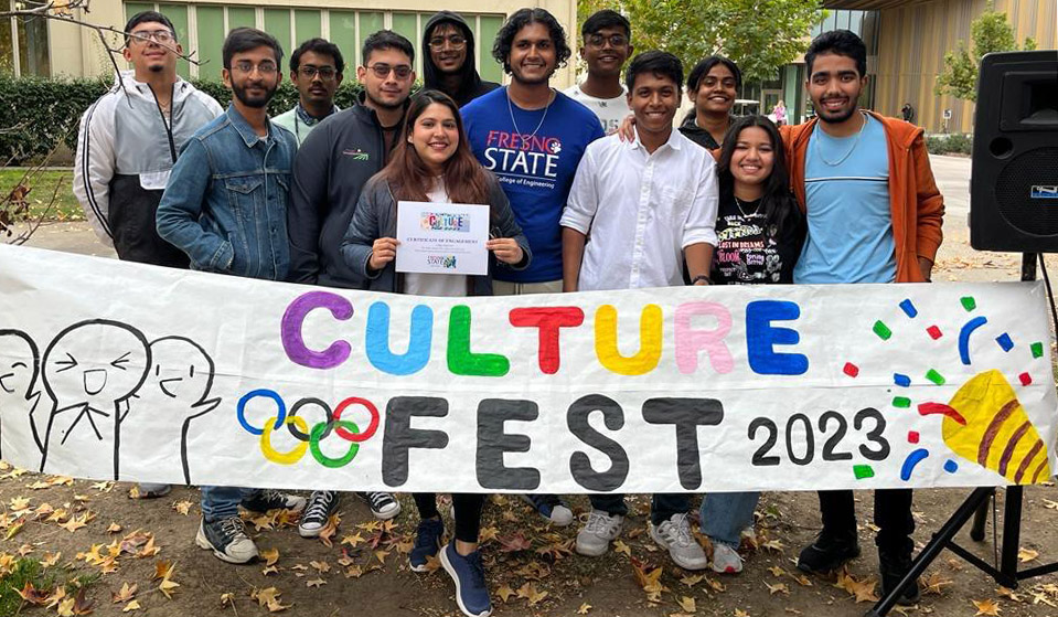 Mansi and students at cultural awareness week