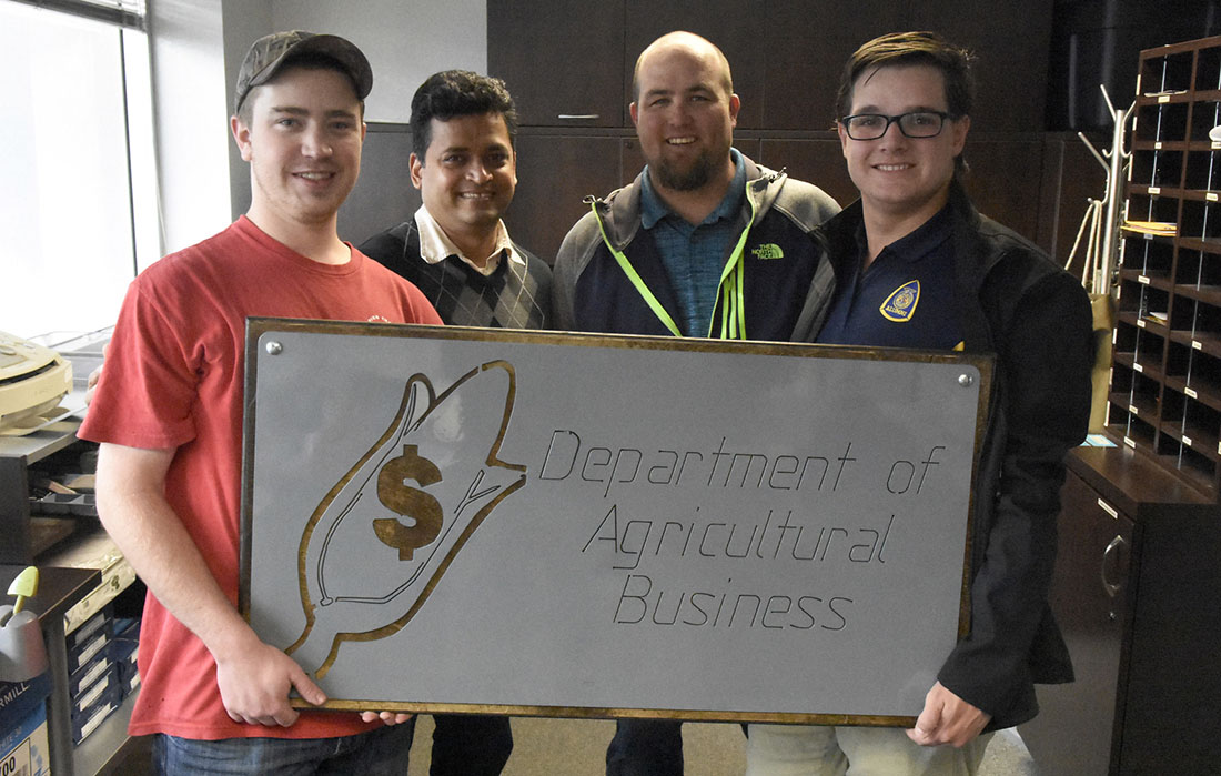 Mechanized ag students use new machinery to create signs for campus clients like the ag business department.