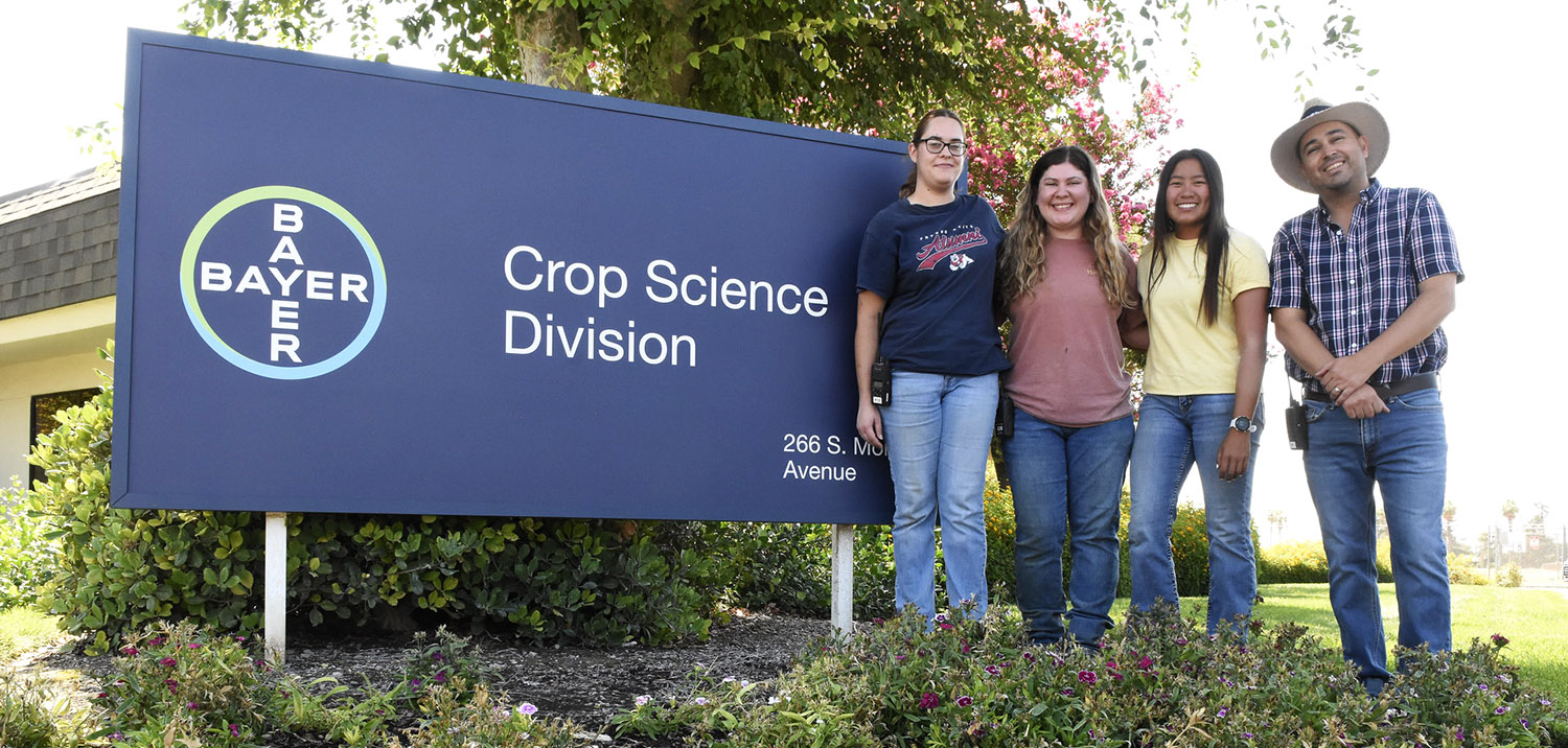 Bayer Crop Science Summer interns (Fresno State student Kiera Searcy & alumna Anabel Padilla and Cal Poly SLO student Jillian Gipson) with station manager Jose Cabrera at Bayer Research Farm near Fresno.