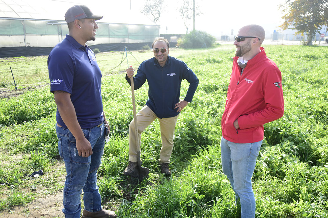 Fresno State plant science student Israel Rangel Galvan with faculty Dr. Ranjit Riar and Dr. Jacob Wenger at campus horticultural unit field plot.