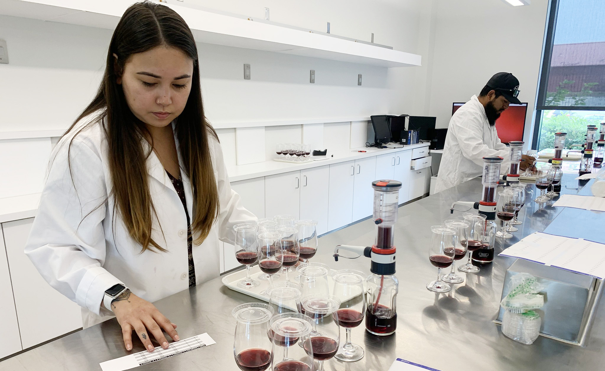 Students prepare samples for sensory test at Jordan Agriculrural Research Center. Deborarh Parker Wong & Dr. Miguel Pedroza